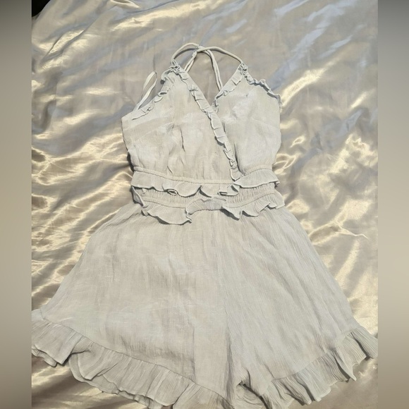 Saints + Secrets Romper - Picture 1 of 2